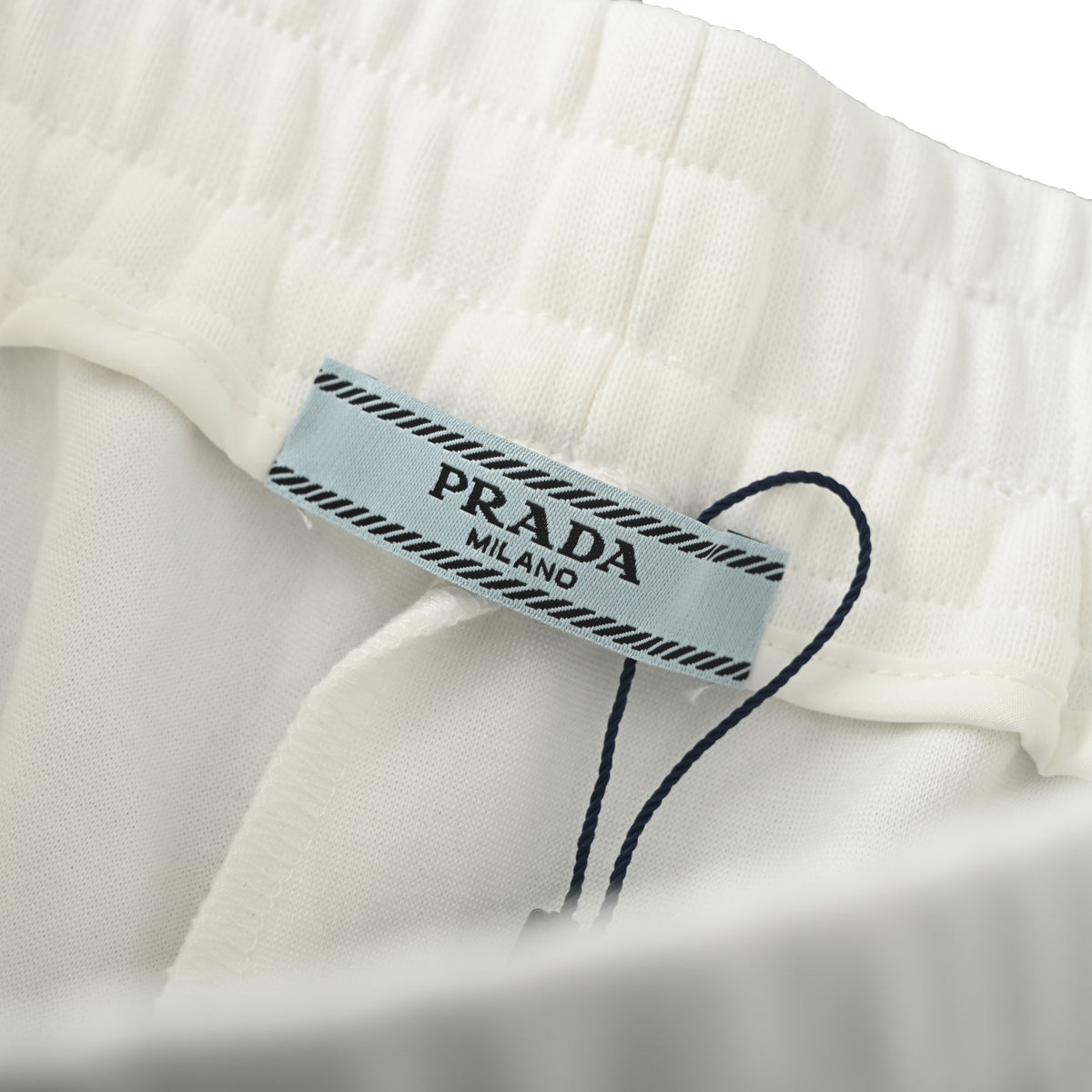 Prada Embroidered Badge & Lettering Shorts