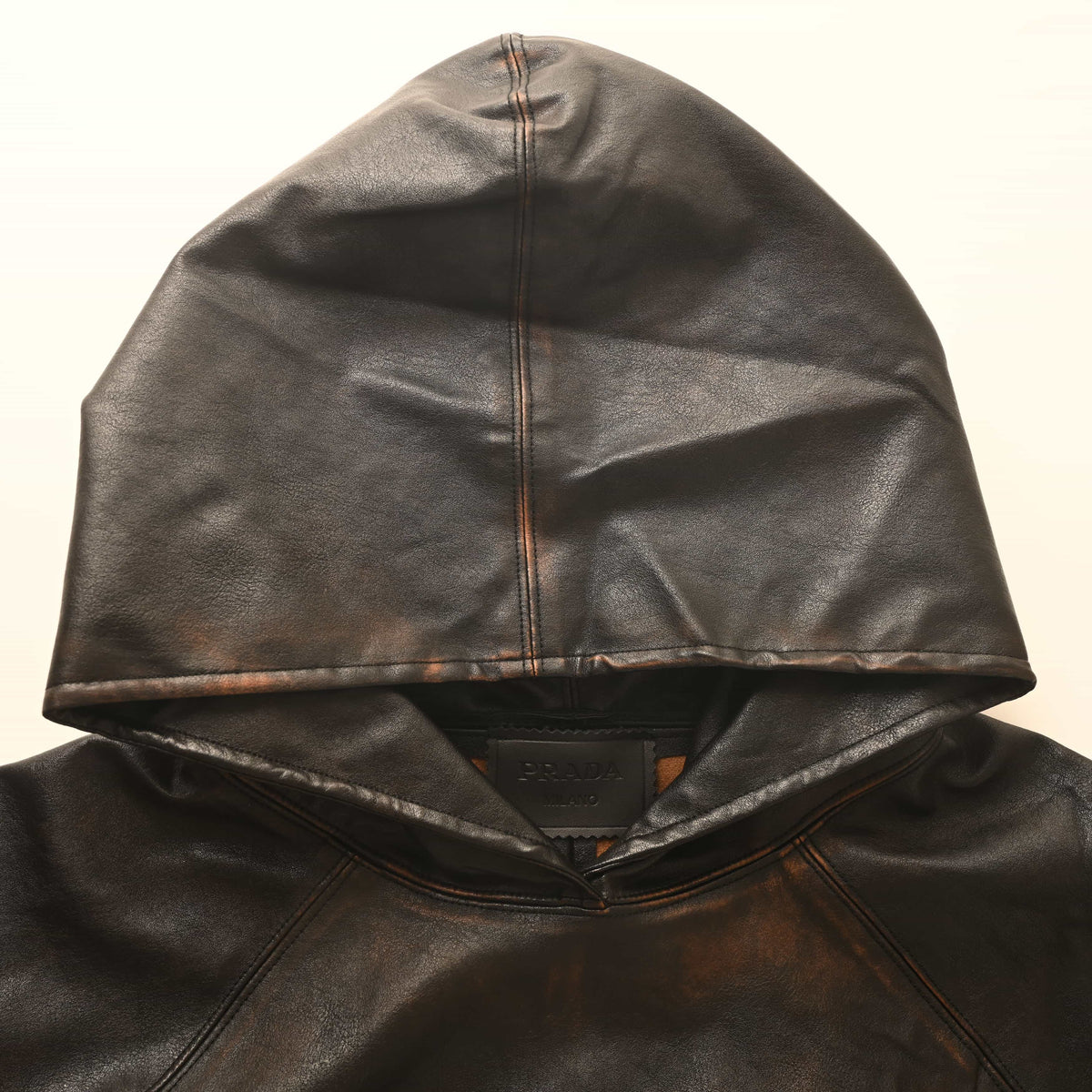 Prada Distressed Leather Hooded Jacket with Raglan Sleeves