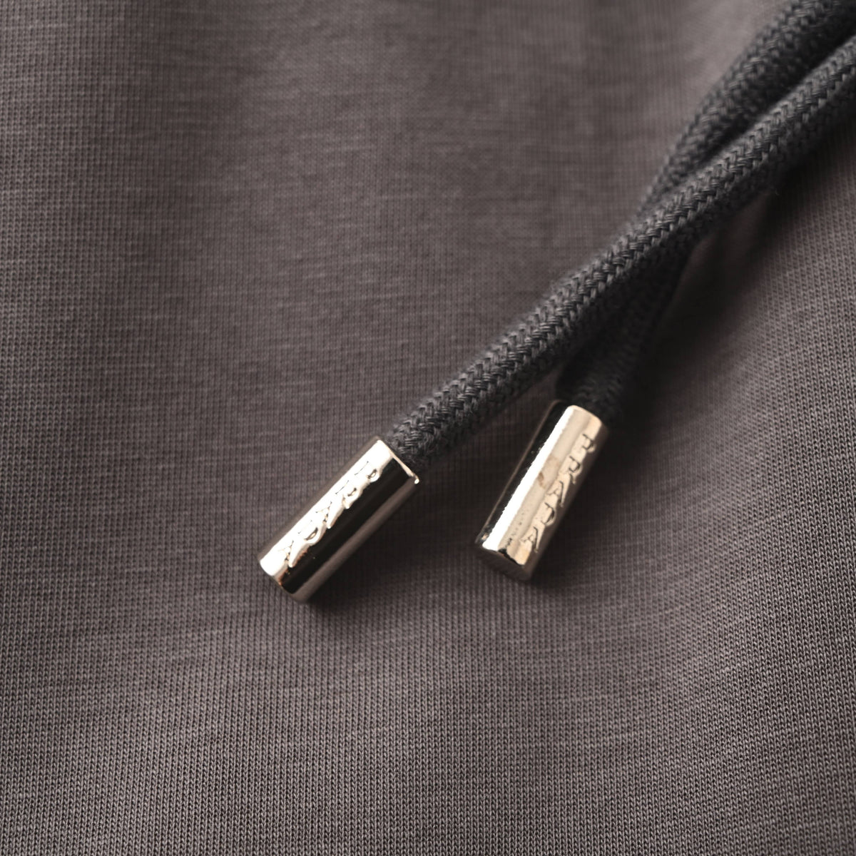 PRADA Contrast-Panel Tapered Joggers with Rivet Details