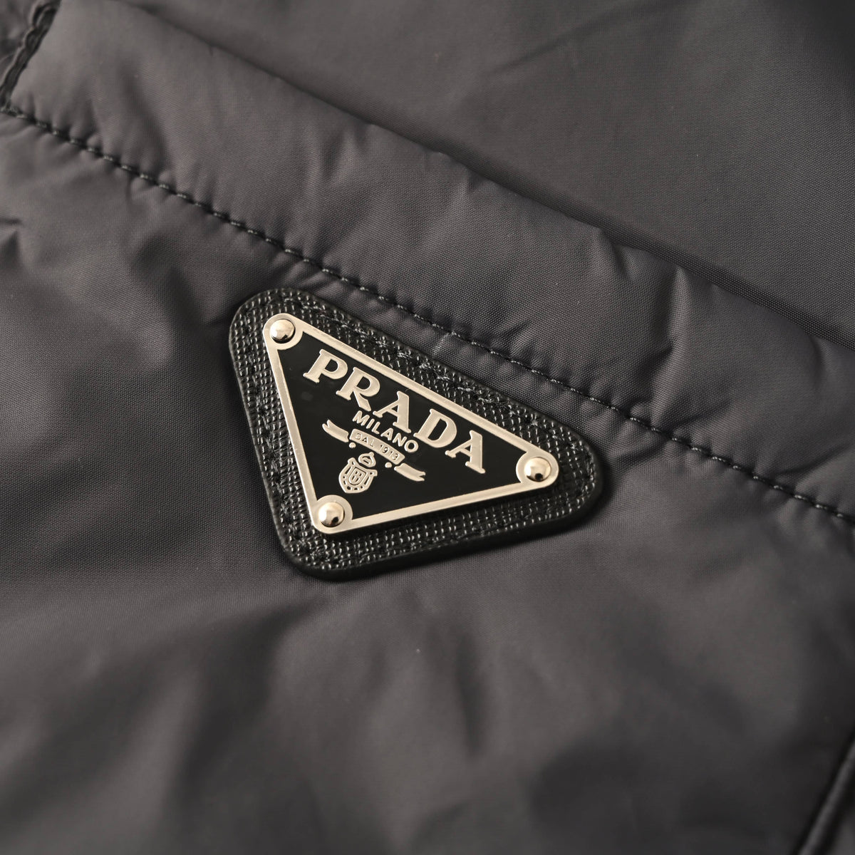 Prada Triangle Logo Recycled Nylon Padded Jacket with Dropped Shoulders