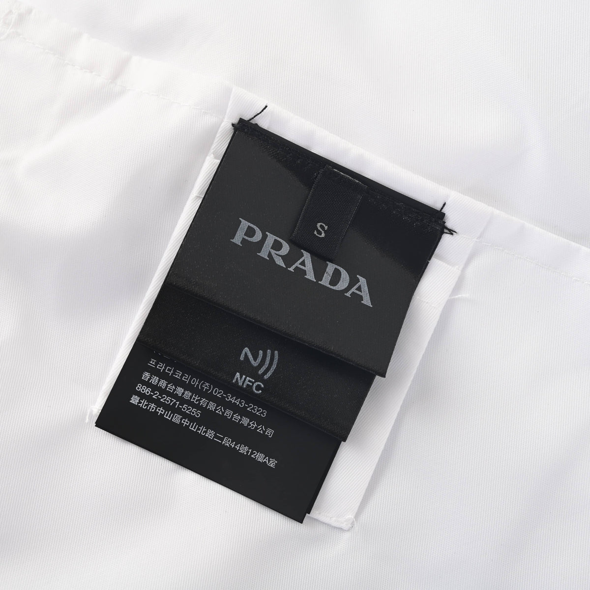 Prada Relaxed-Fit Recycled Nylon Hooded Jacket with White Triangle Logo