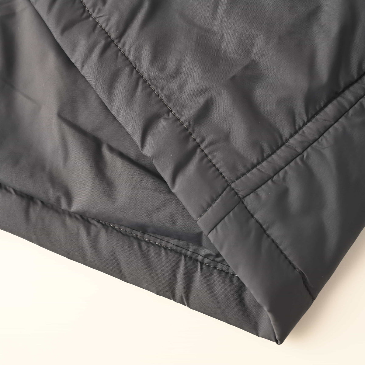 Prada Triangle Logo Recycled Nylon Padded Jacket with Dropped Shoulders