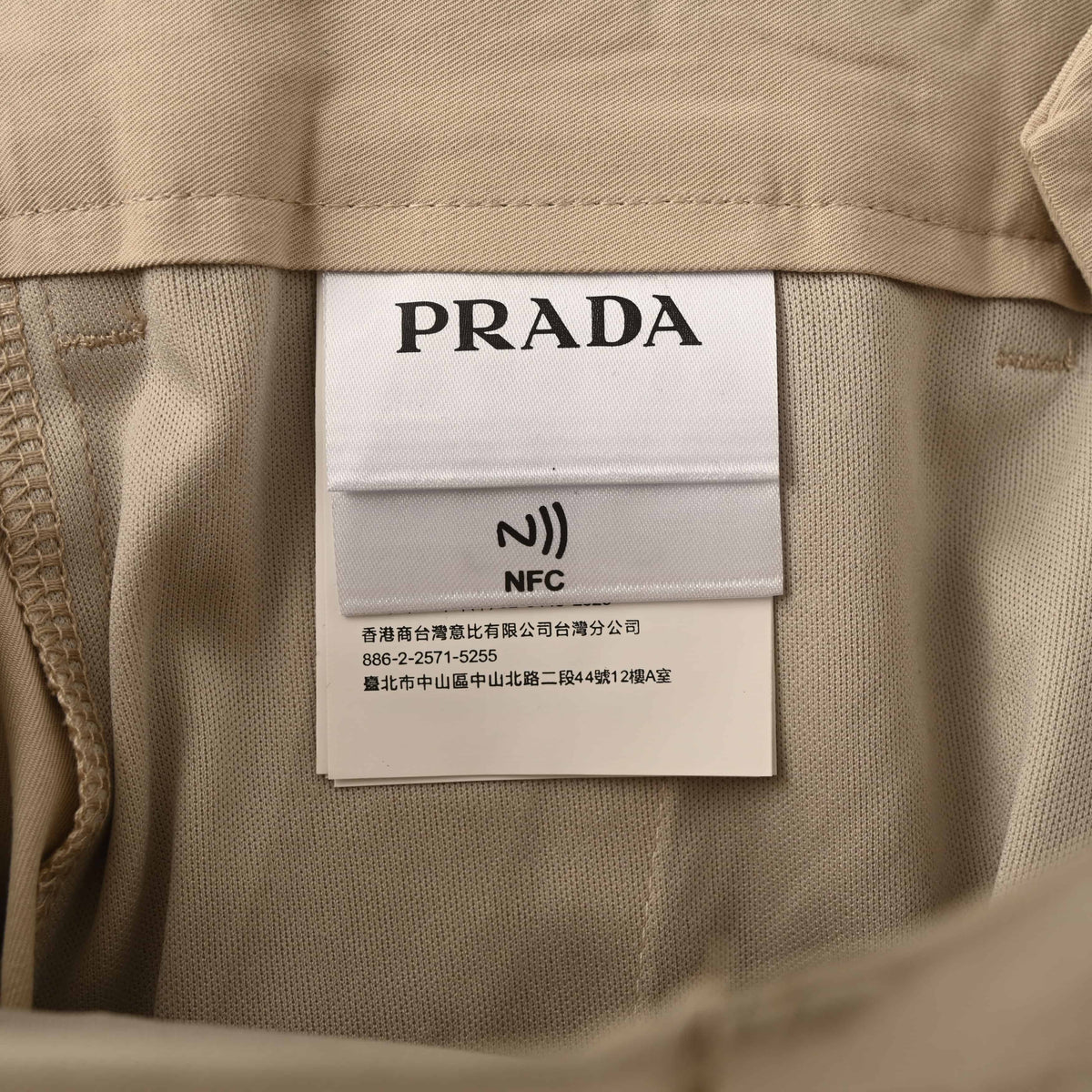 PRADA Beige Pleated Tailored Trousers with Triangle Keyring