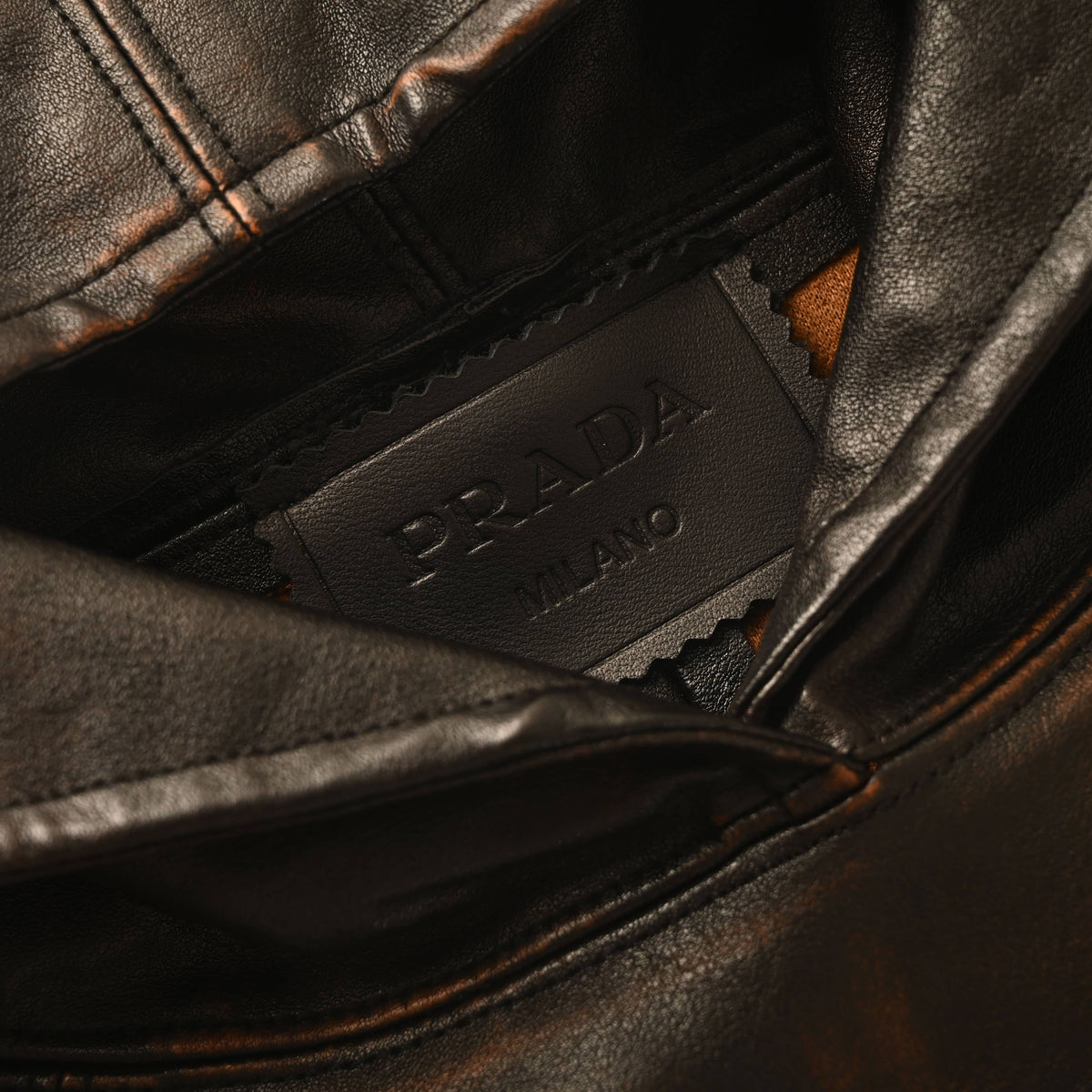 Prada Distressed Leather Hooded Jacket with Raglan Sleeves