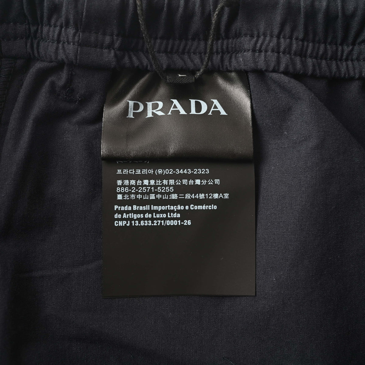 Prada Cotton-Linen Blend Casual Trousers with Lettering Label