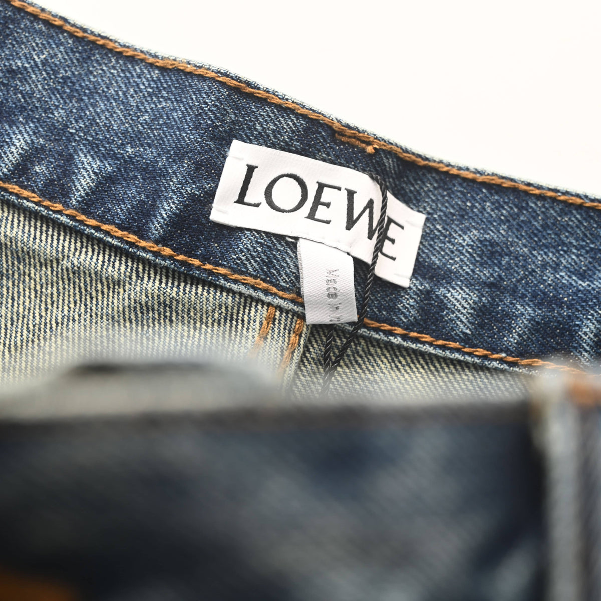 106_LOEWE罗意威 裤腿贴饰单宁牛仔长裤