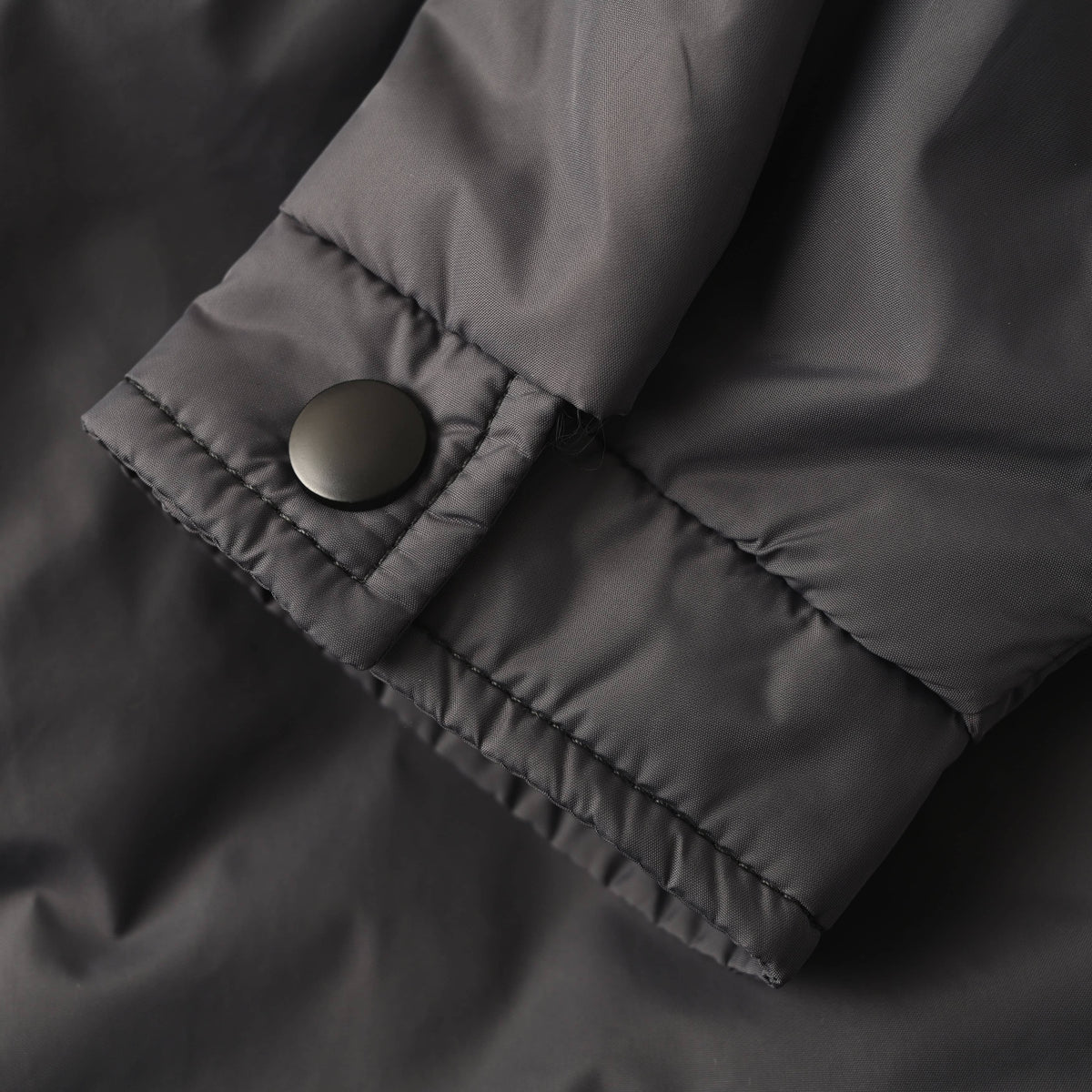 Prada Triangle Logo Recycled Nylon Padded Jacket with Dropped Shoulders