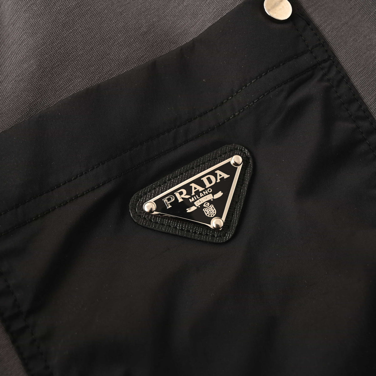 PRADA Contrast-Panel Tapered Joggers with Rivet Details