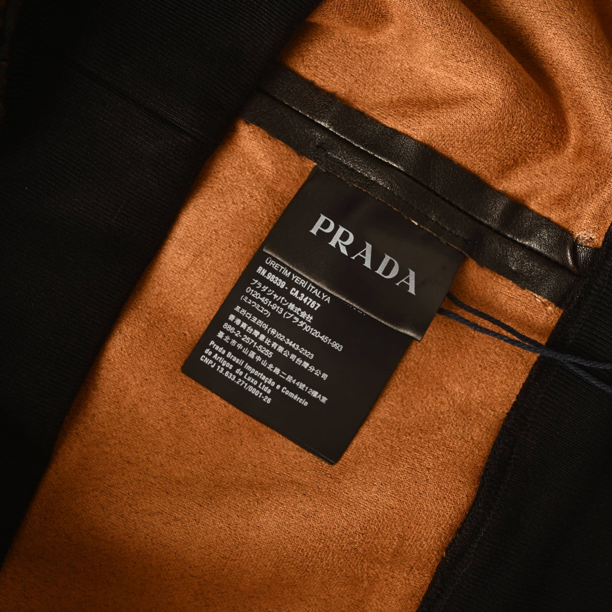 Prada Distressed Leather Hooded Jacket with Raglan Sleeves