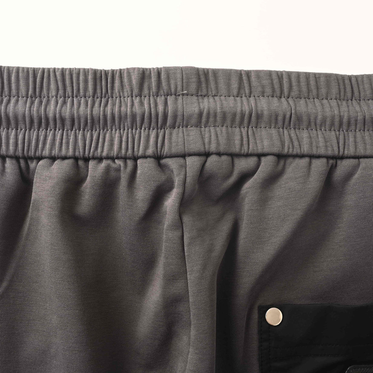 PRADA Contrast-Panel Tapered Joggers with Rivet Details