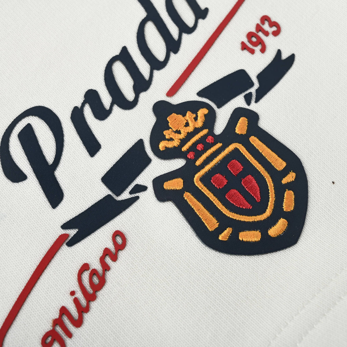 Prada Embroidered Badge & Lettering Shorts